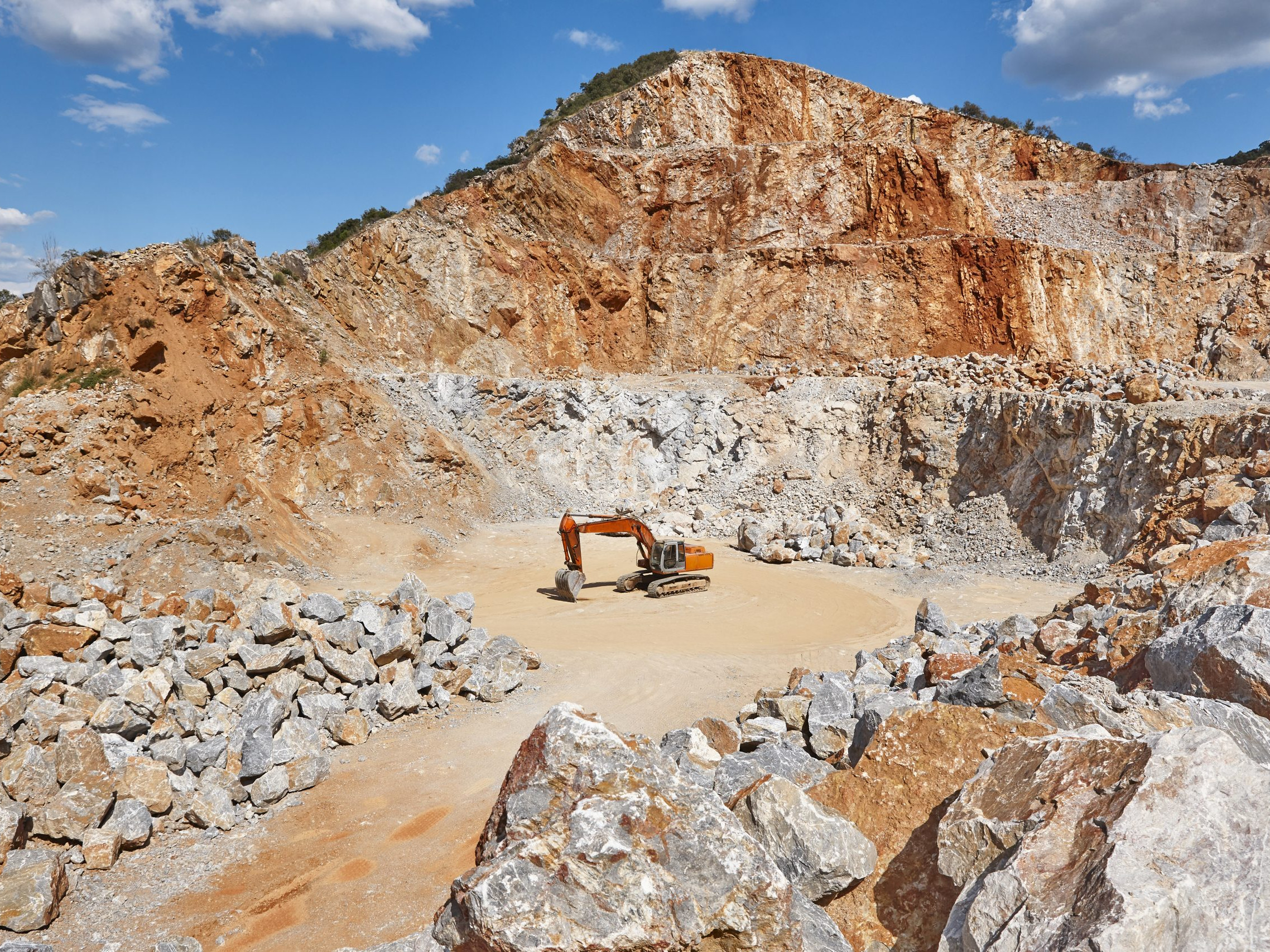 Heavy excavator on a quarry. Excavation machinery.