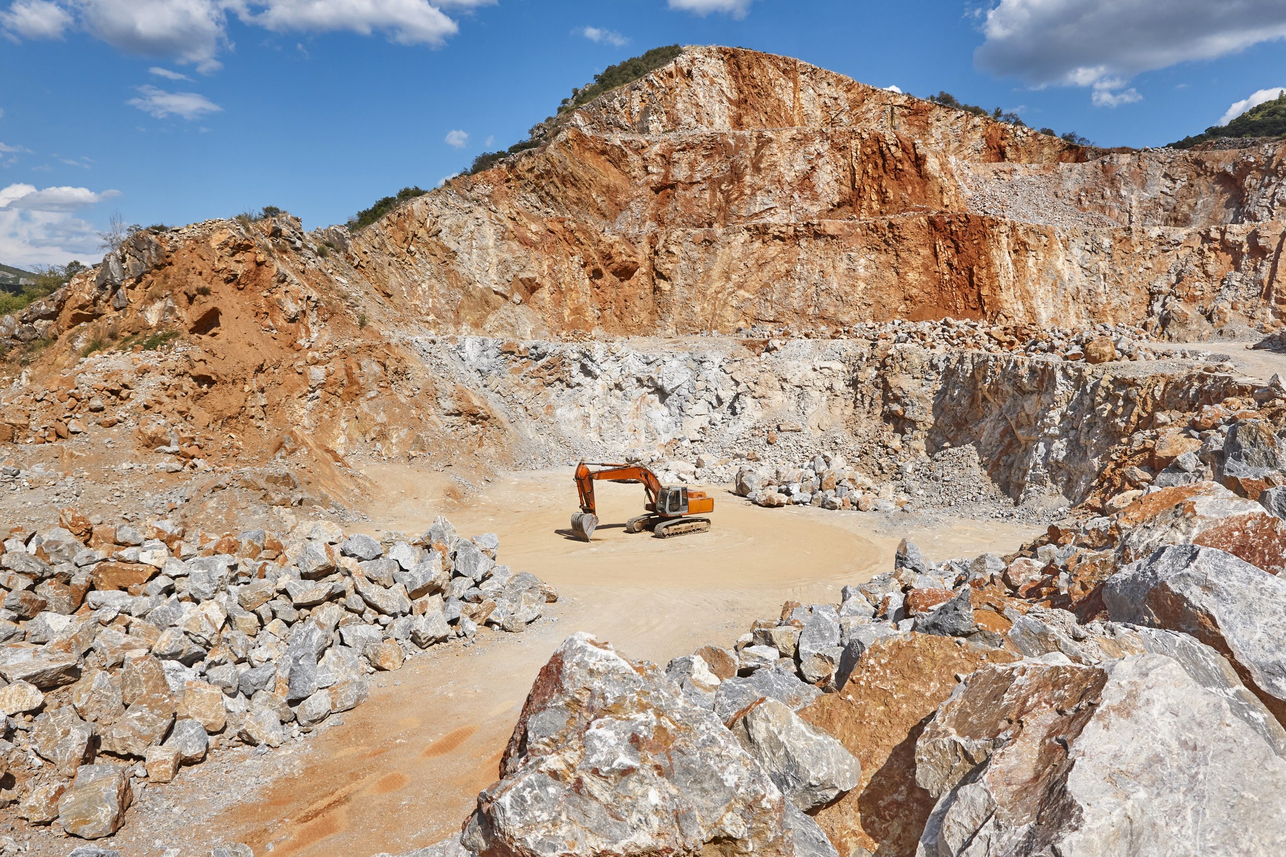 Heavy excavator on a quarry. Excavation machinery.